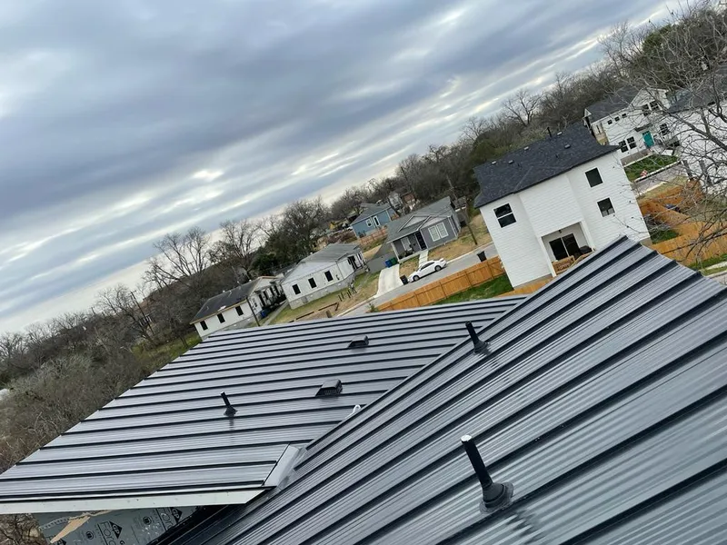 Standing seam metal roof panels with vents for Skylight Repair in Wheeling